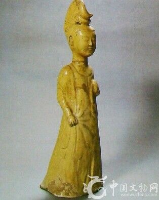 黃釉陶刀髻女俑,唐代,,高39厘米,,1931年河南省洛陽(yáng)出土。