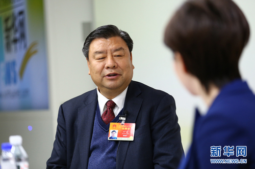 2015年3月12日,，全國人大代表、中國吉林森工集團董事長柏廣新做客新華會客廳,。新華網(wǎng) 李江 攝