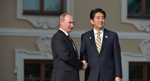 安倍普京握手,。