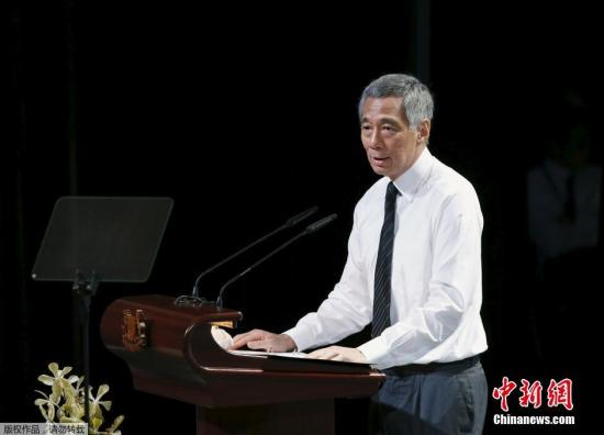 當?shù)貢r間3月29日,，新加坡建國總理李光耀的國葬儀式29日舉行，移靈隊已從國會大廈出發(fā),，前往舉行國葬禮的新加坡國立大學(xué)文化中心,。圖為當?shù)貢r間29日下午2時在新加坡國立大學(xué)文化中心舉行新加坡建國總理李光耀的國葬儀式。