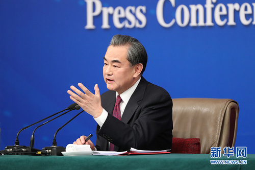 圖為外交部部長王毅回答中外記者提問,。