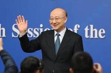 國家質(zhì)檢總局局長支樹平向記者揮手致意