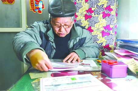  圖片說明：每天,，老王都會花幾個小時的時間整理收藏