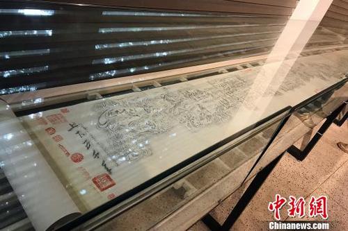 中國僑網(wǎng)巨幅拓片畫《上下五千年》,?！⊥躞拧z