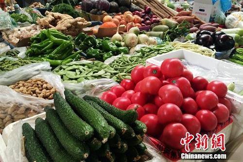 北京百萬(wàn)莊附近一家農(nóng)貿(mào)市場(chǎng),。<a target='_blank' href='http://www.chinanews.com/' >中新網(wǎng)</a> 種卿 攝