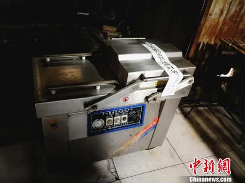 包裝假驢肉的真空包裝機,?！±顣詡?攝