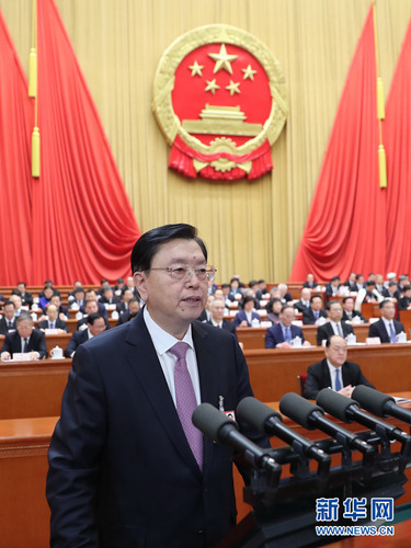 3月11日,，十三屆全國人大一次會議在北京人民大會堂舉行第三次全體會議,。受十二屆全國人大常委會委托，張德江向大會作全國人大常委會工作報告,。新華社記者 鞠鵬 攝