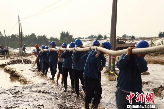 資料圖：濰坊受災縣市救援現(xiàn)場。