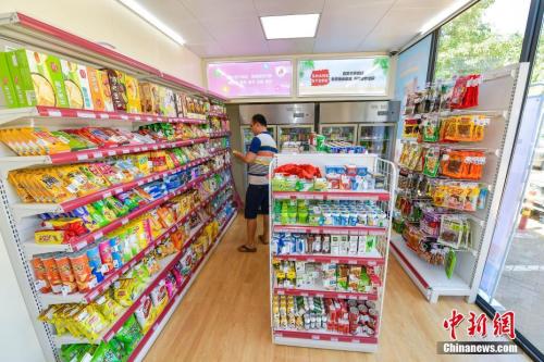資料圖：一位?？谑忻裨跓o人便利店體驗(yàn)購(gòu)物,。<a target='_blank' href='http://www.chinanews.com/'>中新社</a>記者 駱云飛 攝