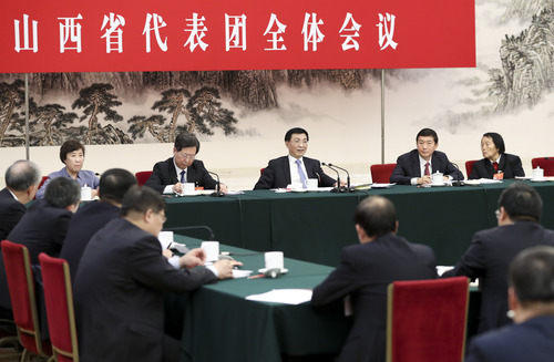 3月12日，中共中央政治局常委,、中央書記處書記王滬寧參加十三屆全國人大二次會議山西代表團的審議,。新華社記者 丁海濤 攝