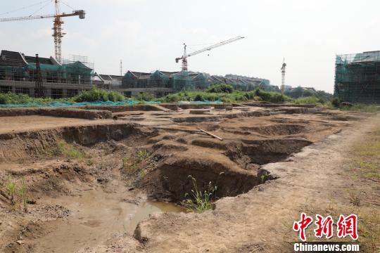 圖為梅里遺址現(xiàn)場(chǎng),?！」芤帏Q 攝