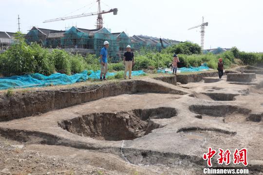 圖為梅里遺址現(xiàn)場(chǎng),?！」芤帏Q 攝