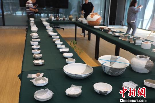 圖為梅里遺址出土的文物遺存,?！」芤帏Q 攝