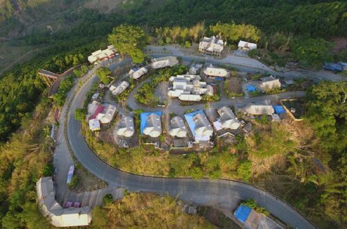 云南省西盟佤族自治縣勐梭鎮(zhèn)秧洛村到周邊山村和縣城的公路（2019年5月28日無人機拍攝）,。
