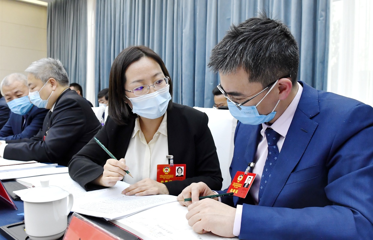 政協(xié)北京市房山區(qū)第九屆委員會第一次會議分組討論會間隙