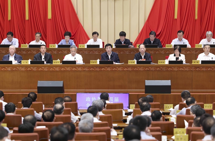 全國政協(xié)十四屆常委會第二次會議閉幕 王滬寧主持并講話