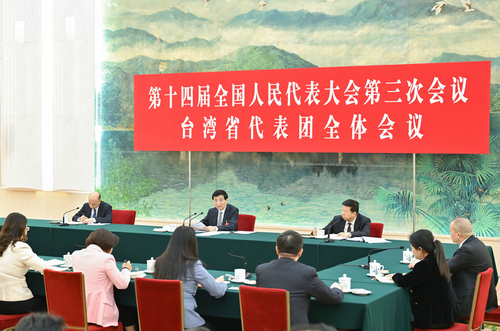 3月7日下午,，中共中央政治局常委,、全國政協(xié)主席王滬寧參加十四屆全國人大三次會議臺灣代表團審議。新華社記者 高潔 攝