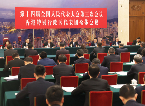 3月7日上午，中共中央政治局常委,、國務(wù)院副總理丁薛祥參加十四屆全國人大三次會議香港代表團審議,。新華社記者 劉衛(wèi)兵 攝